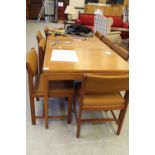Teak dining table and 6 matching chairs