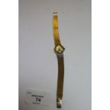 1960's ladies Omega Ladymatic 9ct gold cased wristwatch, with integral Milanese style strap, gross