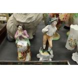 19th Century Staffordshire pottery figure and one other porcelain figure (A/F)