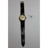 1950's gents Omega 9ct gold cased wristwatch, the silvered dial with numerals, hour batons and