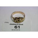 Yellow metal knot ring 3.5g