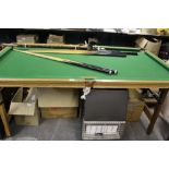 Folding pool table and cues