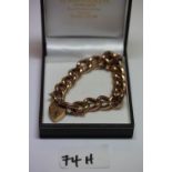 Large linked bracelet - heart shaped padlock clasp marked 375, 19.7g total