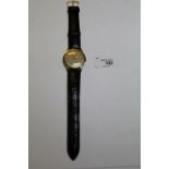 1950's gents Omega 14k gold cased wristwatch, with silvered dial, hour batons and seconds dial,