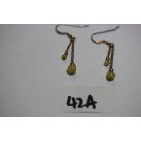 Pair of white metal yellow quartz earrings