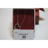 White gold heart pendant on chain, in box