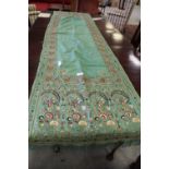 Embroidered table runner with foliate design