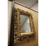 Heavy gilt framed mirror