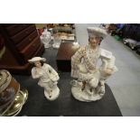 Two Staffs figurines