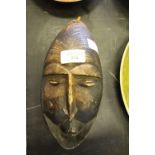 Carved stone African head
