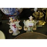 Two porcelain nodding figures