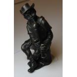 Small cast metal figure, musician