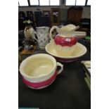 19th Century matching bowl, jug and chamber pot, maroon and gold patterned design