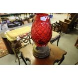Large cranberry glass and brass lamp