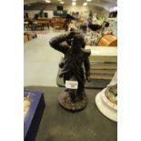 Cast bronzed metal soldier figure