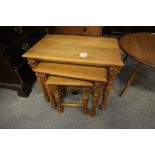 Nest of 3 pine tables with carved brackets