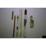Ivory chopsticks, folding fork, etc.