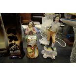 19th Century Staffordshire pottery figure and one other porcelain figure (A/F)