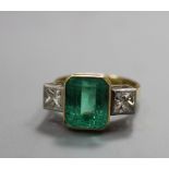 18ct gold emerald and diamond three stone ring