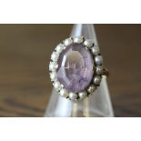 9ct gold, seed pearl and amethyst ring, pale central amethyst approx 8ct, ring size N