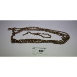 Gold coloured metal 152cm muff chain with spare link, 28g