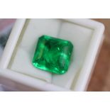 Heat treated octagon cut 7.67ct natural emerald, with GGL certificate