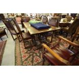 Large Carved Oak Dining Table and 6 Leather and Carved Oak Chairs