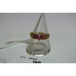 Victorian gold coloured metal red (thought ruby) three stone ring, approx combined 0.5 ct