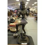 Indonesian bronze Hindu figure - Shiva standing on a baby