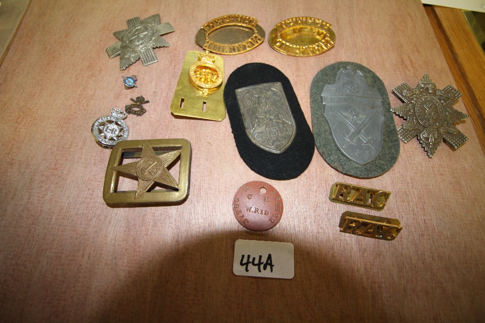 Military badges, British, German, Russian