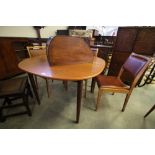 Extending teak dining table and three chairs