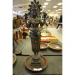 Indonesian bronze Hindu figure - Vishnu, on circular wooden base