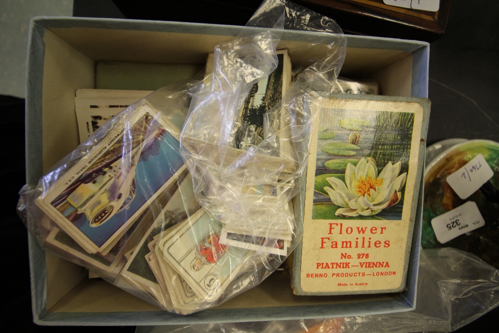 Box of cigarette cards, postcards, stereoscope cards