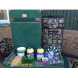 Suitcase, shopping trolley, box of storage jars etc