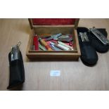 Wooden Box Containing Swiss Army & Other Penknives