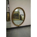 George III Oval Mirror - figure at base