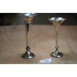 2 silver spill vases