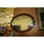 Grained oval mirror
