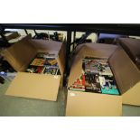 2 boxes of mixed DVDs