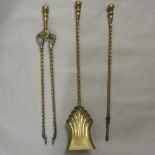 Set of three Victorian brass fire irons, largest 66cm long