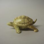 Royal Worcester porcelain blush ivory 'okimono' in the form of a tortoise, puce printed mark and