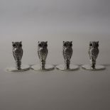 Set of four silver 'Owl' menu holders, each with red set eyes, 2.5cm high, stamped .925