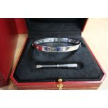 Cartier 18ct white gold 'Love' bangle set with six diamonds each approx 0.10, size 17, No. F01273,