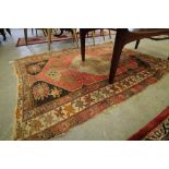 Faded Antique Kazak Rug