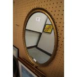 George III Oval Mirror - figure at base