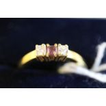 18ct gold mounted ruby and diamond ring, the square cut stones each approx 0.10ct, ring size R