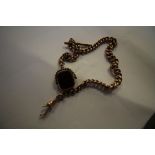 9ct gold curb chain (clasp A/F) with bloodstone swivel fob, 57g gross weight
