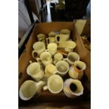 Box of various mugs and vases