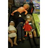 3 Sasha Dolls, 'Sasha', 'Gregor' and Baby Gregor and 2 other dolls