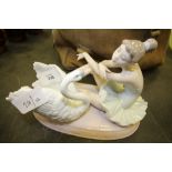 Lladro girl and swan group